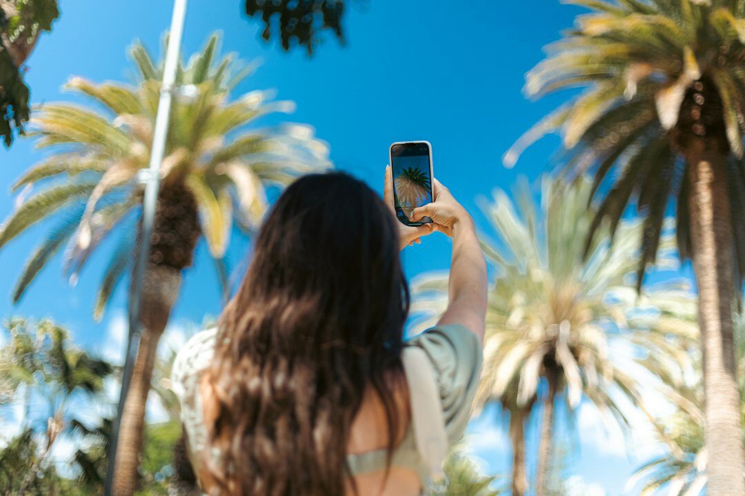 Uruguayan social media influencer taking a selfie outdoors